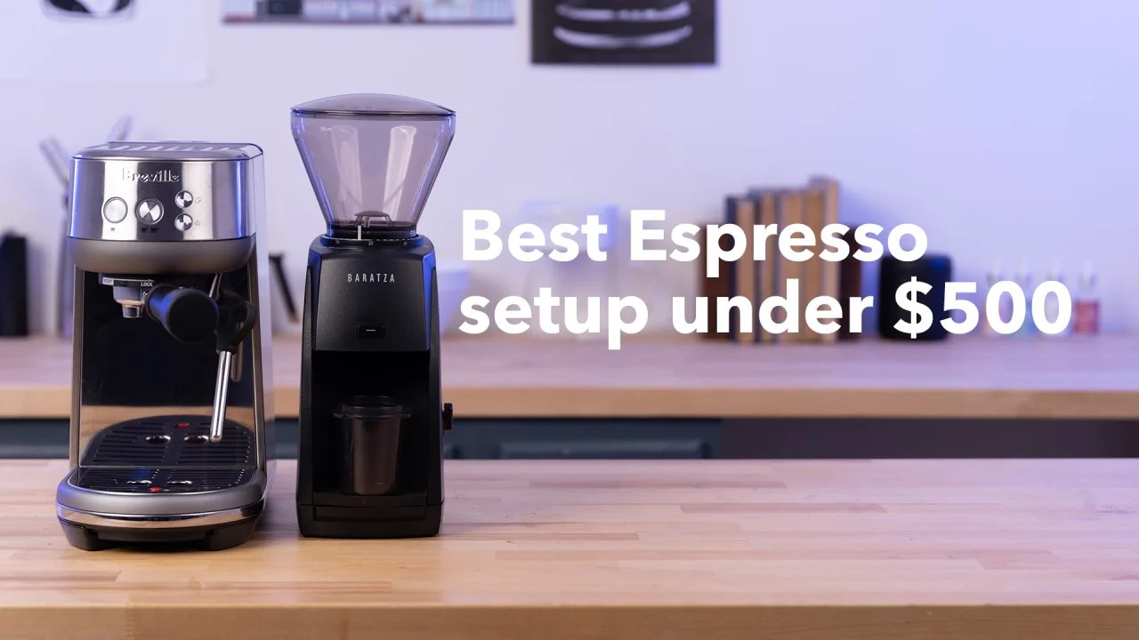Essential tools for brewing delicious espresso at home laid out on marble.