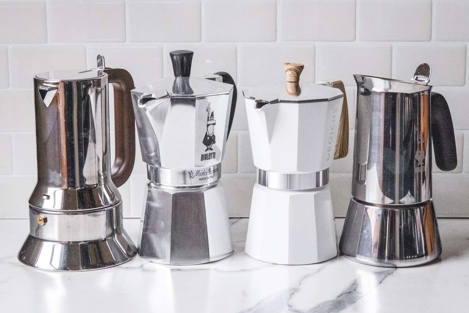 Precise preparation of water and coffee grounds for a balanced moka pot extraction.